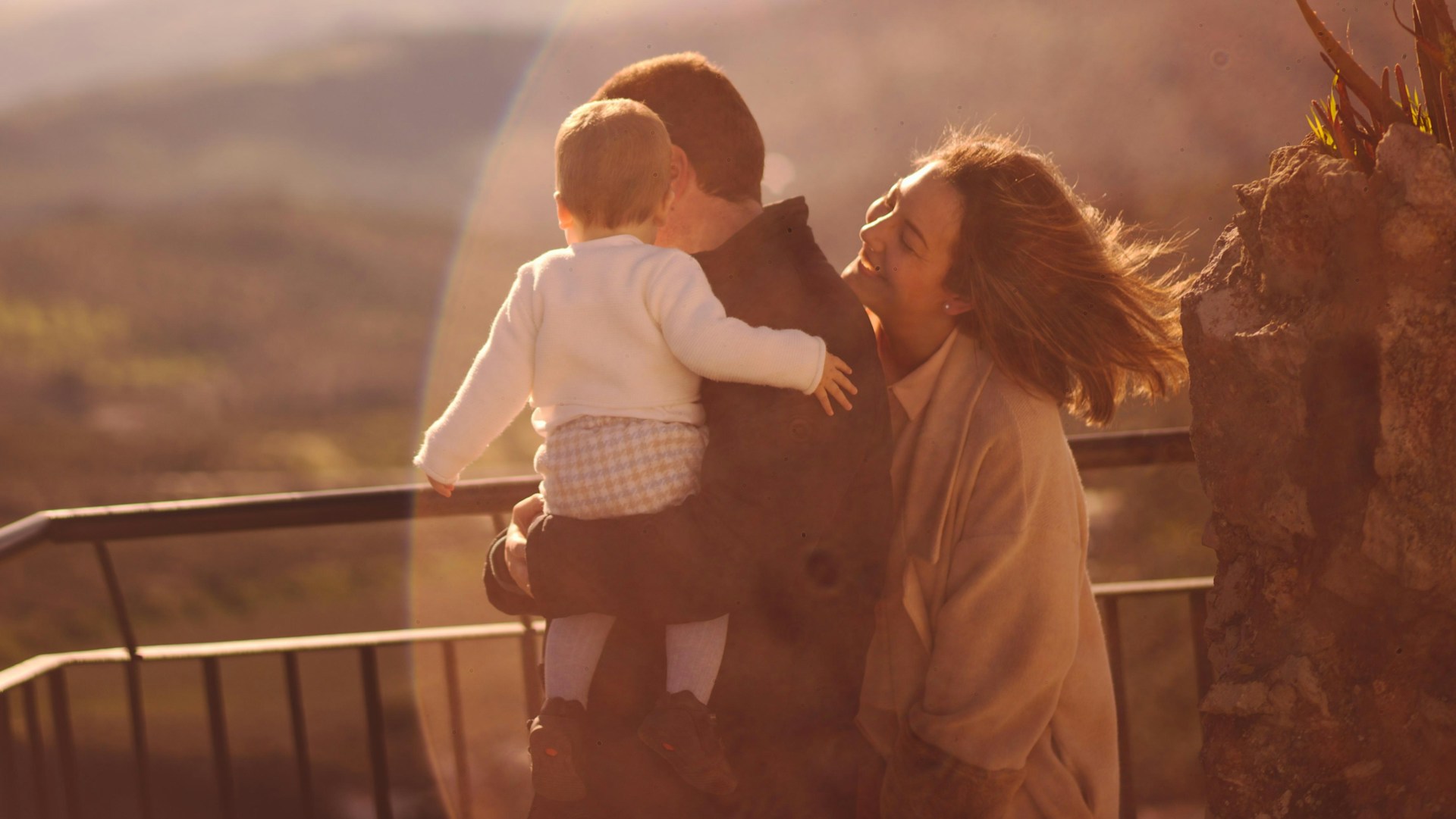 Family enjoying a sunset together